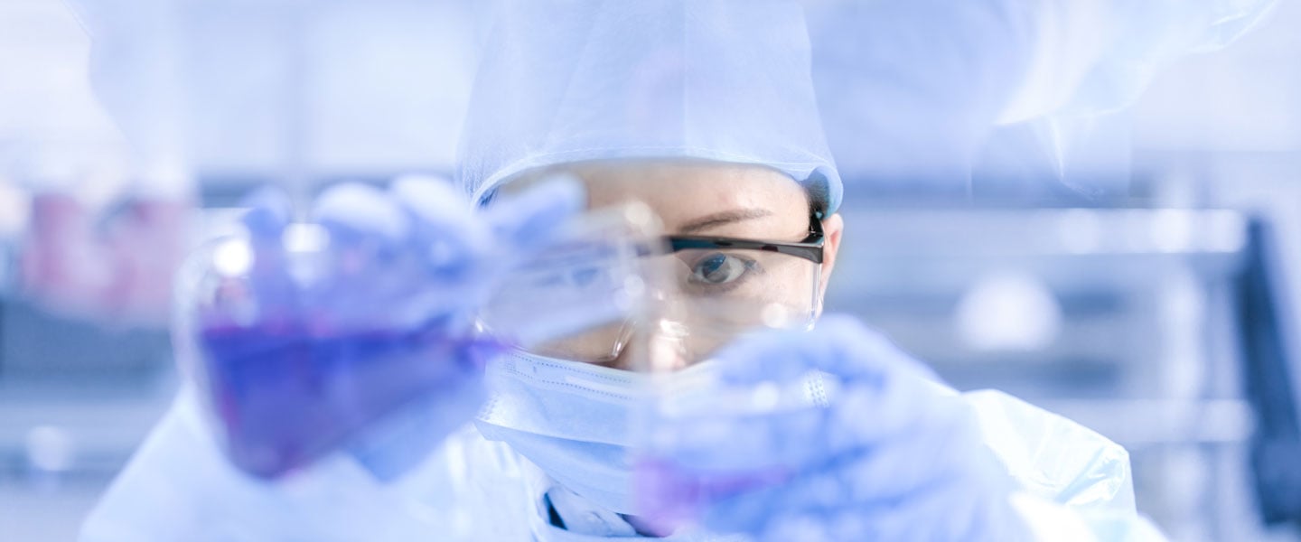 Scientist using lab equipment
