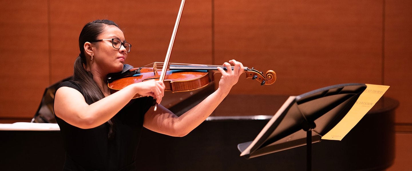 Student playing violin
