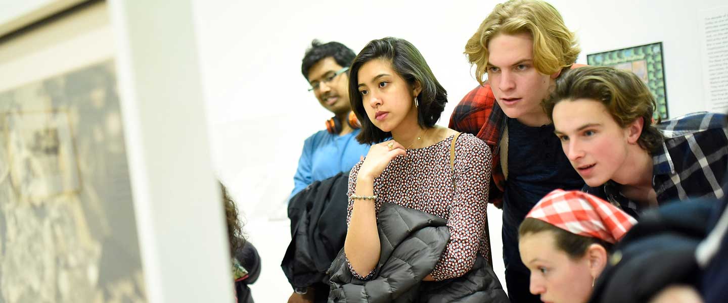 students looking at art