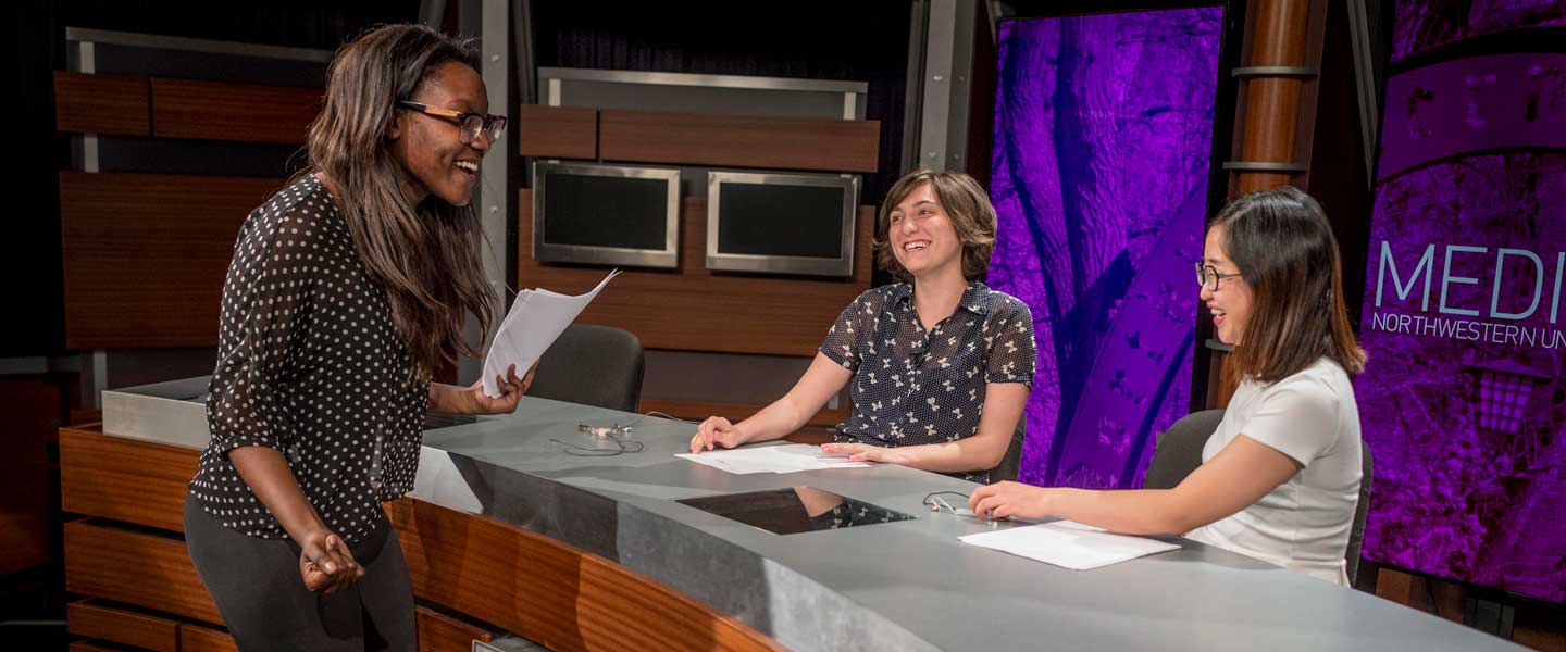 Students in a news room