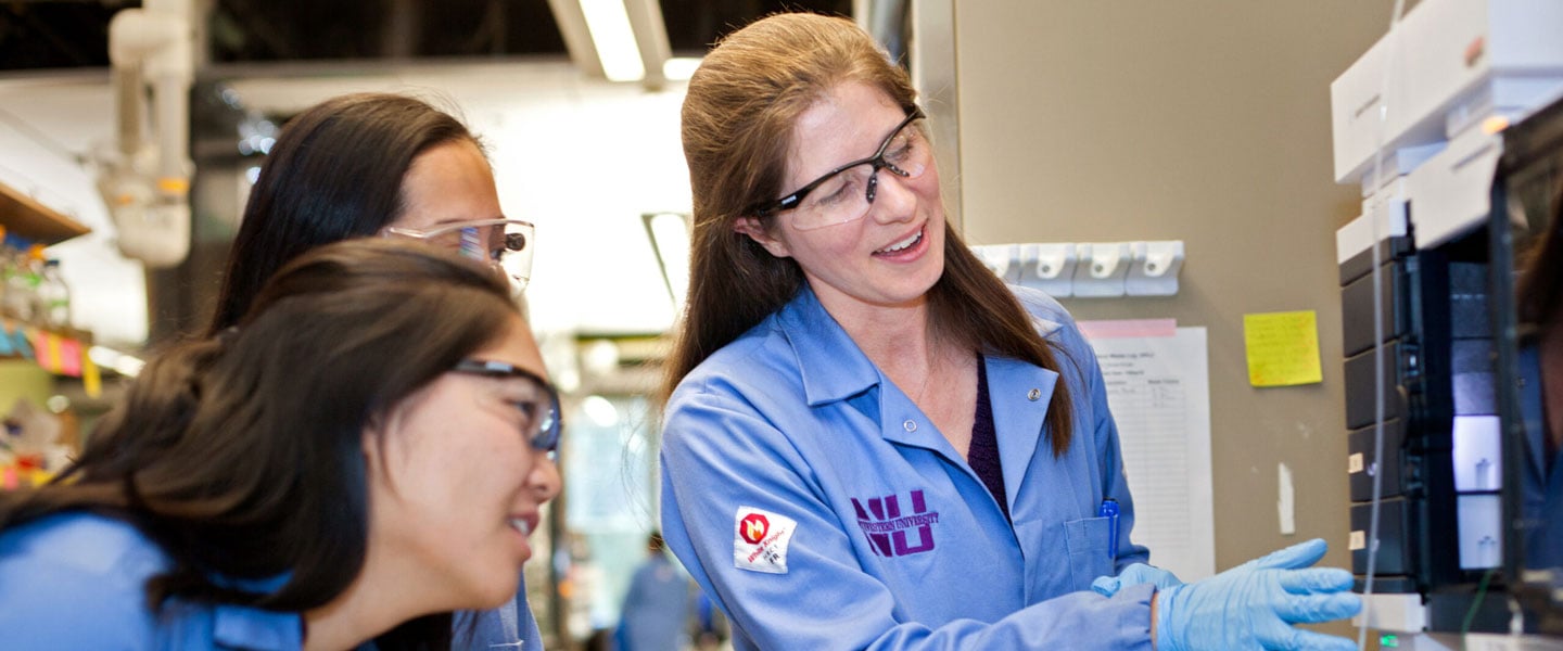 Students using science equipment